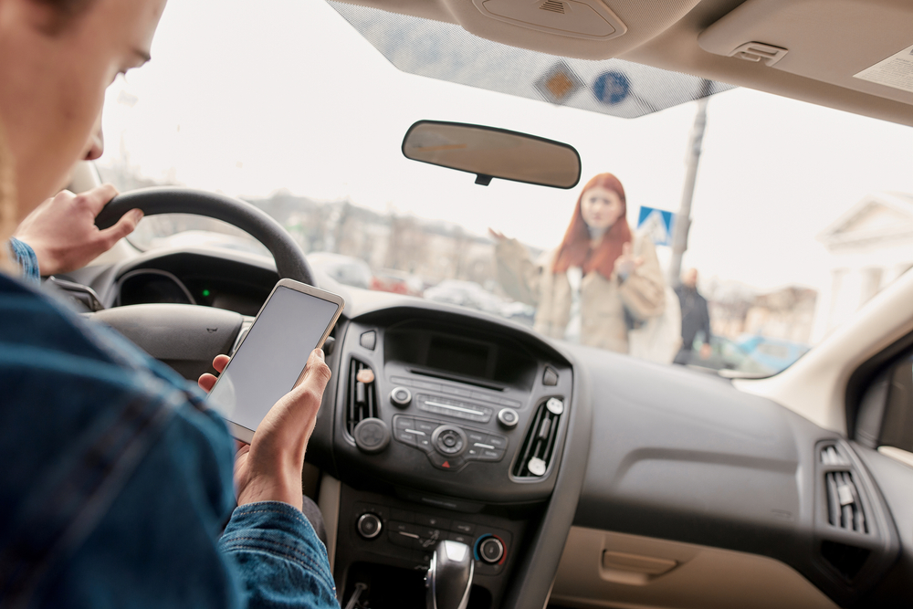 What is the Difference Between Distracted Driving and Careless Driving Under Florida Law?
